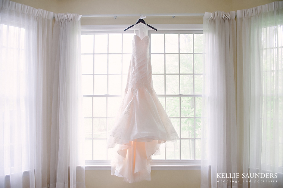 Beautiful wedding gown in window